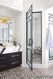 Using burlap for the curtains (if you have a window) makes for a wonderful natural touch to the décor, and the golden vanity, made with chalk paint, lets the room pop a bit more. 15 Black And White Bathroom Ideas Black White Tile Designs We Love