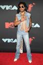 Lenny Kravitz's Rockstar Career Brings Home the Bacon! See the ...