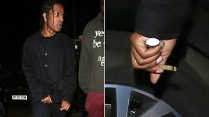 Rihanna and asap rocky are officially an item!. A Ap Rocky Clutches Joint As He Leaves Rihanna S Fenty Party After British Fashion Awards Metro News