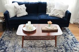 Choosing a coffee table that matches your colors and style is important to make your room and furniture flow. 3 Ways To Style A Coffee Table Minimalist Coffee Table Minimalist Coffee Table Decor Contemporary Decor Living Room