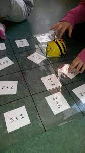 beebot and math a clear piece of plastic marked into the appropriate squares then change the questions underneath children cod bee bot activities beebot math