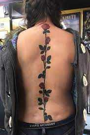 Summer is here — and while florals for this particular season aren't exactly groundbreaking in fashion, they're timeless in tattoo form. Tattoo Uploaded By Marc Deleon Rose Tattoo Up Spine 693168 Tattoodo