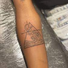 A great way to bring a twist to your aquarius tattoo for guys is by having the true water carrier image on one side of your arm. 21 Original Tattoo Ideas For The Aquarius Popsugar Smart Living