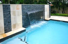 Some of the most popular types of water features are waterfalls, fountains, cascades, sheetfalls, water walls and spillways. Modern Waterfall Garden Pool Waterfall Modern Waterfall Methodology If You Want To Relax Outside In Pool Waterfall Pool Water Feature Modern Swimming Pool