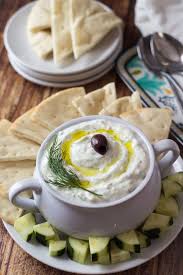 It's so easy to make with simple ingredients, including greek yogurt, cucumber, fresh herbs, olive oil, lemon and garlic. Best Dip Recipes Authentic Greek Tzatziki Easy Recipe Ideas For A Party Appetizer Cold Recipe Ideas For Chips Cro Recipes Tzatziki Recipes Greek Recipes