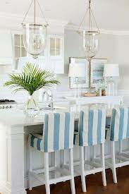 Blogger will taylor of bright bazaar created a modern, masculine take on coastal style in his renovated beach house kitchen with a palette of intense navy blue and soft cool grays that gives it a calming and homey appeal. Kicthen 2 Beach House Interior Design Chic Beach House Beach House Interior