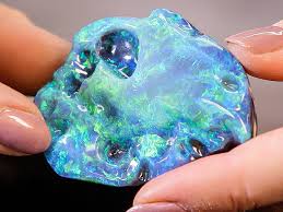 If this stone was mounted in a setting with a cup bezel, it might be impossible to tell if it was a solid opal or a doublet. Why Black Opal Is One Of The Most Expensive Gemstones In The World