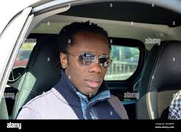 PSG's Peguy Luyindula arrives for the soccer training session at Camp Des  Loges in Saint-Germain en Laye near Paris, France
