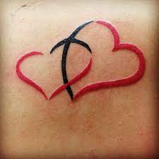Geometric shapes were used to make a pattern inside the heart tattoo. Pin On Fashion