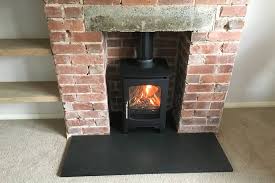 After we ripped the carpet out of our second living area and put in the wood floors i knew that i would want a bit more tile. Woodburner And Slate Hearth Installation In Tiverton Cosy Stoves