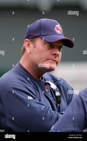 Cleveland Indians manager Eric Wedge, center, pulls starting pitcher Fausto  Carmona (55) for a reliever after a two-run homer by Texas Rangers' Brad  Wilkerson in the sixth inning of a baseball game