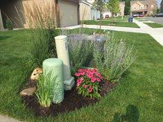 Landscaping ideas to hide call them necessary evils: Hide That Ugly Utility Box