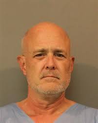 Man wanted in connection to robberies arrested after alleged carjacking,  police say