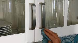 Cleaning kitchen cabinets with vinegar and baking soda. How To Clean Kitchen Cabinets Including Those Tough Grease Stains Better Homes Gardens