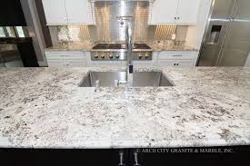 As with all black granite, it pairs naturally with white cabinets for a traditional feel. White Granite Countertops In St Louis Arch City