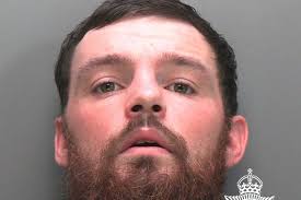 Drowned dad tied in car