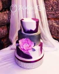 Cadbury S Purple Marble Effect 3 Tiered Wedding Cake With Large Peony Rose Sugar Flower And M Wedding Cake Marble Cinderella Wedding Cake Wedding Cake Prices