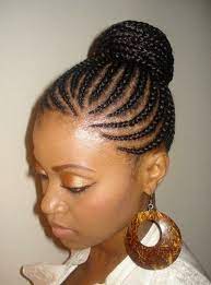This look would require very thick and long hair to pull off. Cornrows Bun Updo For Women Hairstyles Weekly Natural Hair Styles Short Hair Styles African American Braided Hairstyles For Black Women