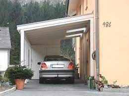 Carport Mit Schragdach Zwei Glasdach Aufsatze Uber Den Fenstern Haus Umbau Carport Terrasse Carport Mit Schuppen