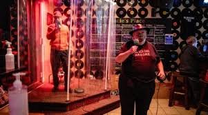 Canadian karaoke bar installs shower cabin for singers as precaution  against COVID-19 | Trending News - The Indian Express