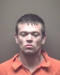 Vermontville man charged with stabbing someone inside a moving vehicle