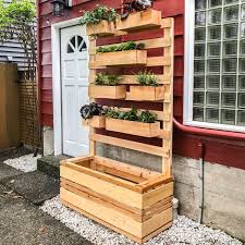 If you plan on having bigger house plants or add some green spaces onto your balcony or patio, larger planters will help you create and compose your own mini garden. Diy Vertical Garden Wall Planter With Plans The Handyman S Daughter