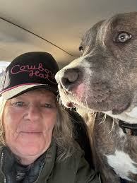 Pittie runs free with favorite buddy