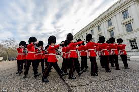 It's all part of the. Queen S Guard Battle Winter Wearing Their Summer Uniforms Daily Mail Online