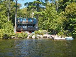 Lincoln Maine 04457 Upper Cold Stream Pond Less Than 30 Ft From The Crystal Clear Water With Easy Access Fo Lake House Rentals Lake Vacation Lakeside Cabin