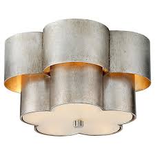 Our original design slim profile hondo wall sconce casts a warm glow through the open ends at the top and bottom of the fixture and a subtle illumination through the starburst design on the face. Lighting With Feminine Flair One Kings Lane