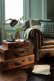 Stacked Vintage Suitcases Are A Creative End Table Stylist Emma Fishman Vintage Suitcase Decor Suitcase Decor Vintage Suitcases