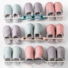 A freestanding towel rack provides flexibility where you place it, making it convenient for guest bathrooms when you have a lot of visitors staying. Bathroom Slippers Wall Mounted Rack Folding Shoes Hanger Self Adhesive Storage Towel Racks Buy At A Low Prices On Joom E Commerce Platform