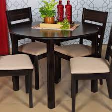 Sky modern design newest 4 seat dinning room set round marble dining table set. Home Centre Montoya Round Contemporary Mdf Veneer Finish 4 Seater Dining Table Without Chairs Brown Amazon In Furniture