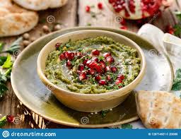 Hummus Houmous D Herbe En Plus Des Graines De Grenade Du Persil De L Huile D Olive Et Des Epices Aromatiques Dans Un Pot En Cer Image Stock Image Du Plus Olive 128714921