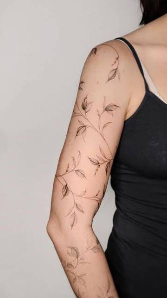 Vines Around Arm Tattoo
