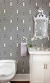 Black And White Powder Room Wallpaper Fabulous Powder Room Features Black And White Geometric Wallpaper Osborne Little Minaret Wallpaper White Wallpaper Black And White Wallpaper Bathroom Decor