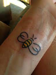 41 cute bumble bee tattoo ideas for girls | stayglam. Cute Bumblebee Tattoo On Left Wrist