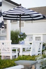 Black And White Striped Outdoor Umbrella Crisp White Outdoor Furniture With Navy And White Stripe Umbrella Outdoor Living Patio Outdoor Rooms
