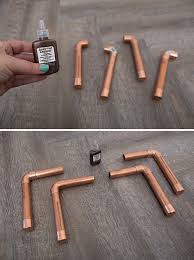 With wire hanger and mini pegs for photo mount, holds up to 4x6 pics , these are all handmade and made to order. This Diy Copper Pipe Wardrobe Stand Is Amazing