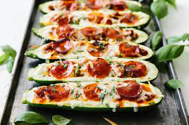 This vegetarian pie, topped with grilled zucchini, fresh ricotta, nutty gruyère, and savory parmesan, is a satisfying mix of colors and flavors. Pizza Stuffed Zucchini Boats Downshiftology