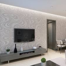Pilihan untuk menutup dinding tidak hanya lagi cat dinding atau membiarkannya terekspos seperti batu bata atau beton ekspos. Jadikan Ruang Tamu Lebih Nyaman Dengan Wallpaper Dinding Minimalis Isi Bangunan