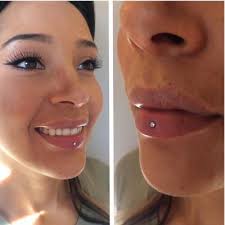 this beautifully healed inverse vertical labret was done by cjmaxwell this lovely lady took great ca face piercings vertical labret piercing facial piercings