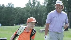 Some fans and many in the sports media world. Junior Golfer Caddies For Phil Mickelson At Dell Technologies Pro Am