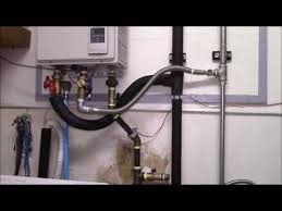 If it's time to replace your water heater, you may be thinking of installing a tankless model in your home. Tankless Water Heater Install Insulation Bonding And Gfci By R Brown