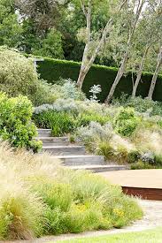 Melbourne Acreage Transformed Into Haven Of Greenery Garden Landscape Design Sloped Garden Australian Garden