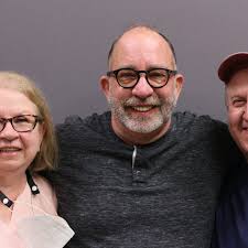 Paul Mott, Patty Mott, and Bobby Mott