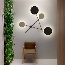 Made from iron with extended durability. Creative Geometric Wall Lamp Uberlightingstore