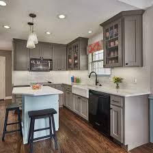 A pair of vintage chandeliers that hung from the ornate ceiling illuminates this kitchen showcasing black. 75 Beautiful Shabby Chic Style Kitchen With Gray Cabinets Pictures Ideas August 2021 Houzz