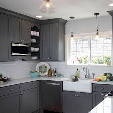 This Gorgeous Light French Gray Sw 0055 Kitchen Has Us Waving Our Baguettes Over Our Heads And Grey Kitchen Cabinets Grey Kitchen Designs New Kitchen Cabinets