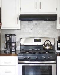 Butcher Block Countertops With Carrara Marble Backsplash Dark Butcher Block Countertops White Cabinets Butcher Block Countertops Kitchen Kitchen Interior Diy